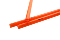 Orange Plastic Piping overlapping each other. 